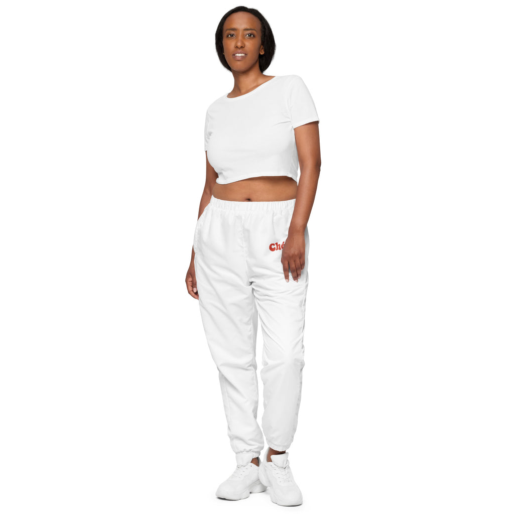 Woman modeling Chérie white track pants