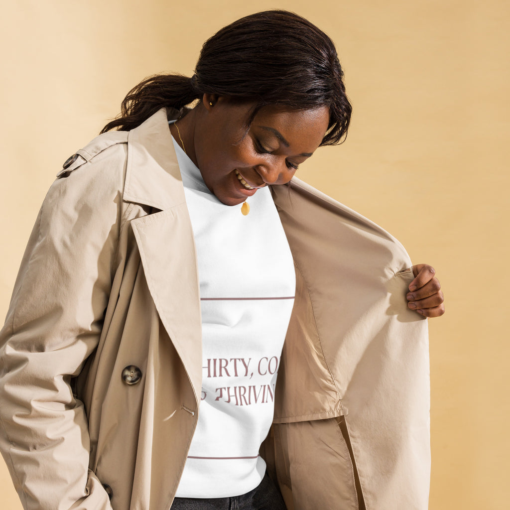 woman modeling fun white sweatshirt and a trench