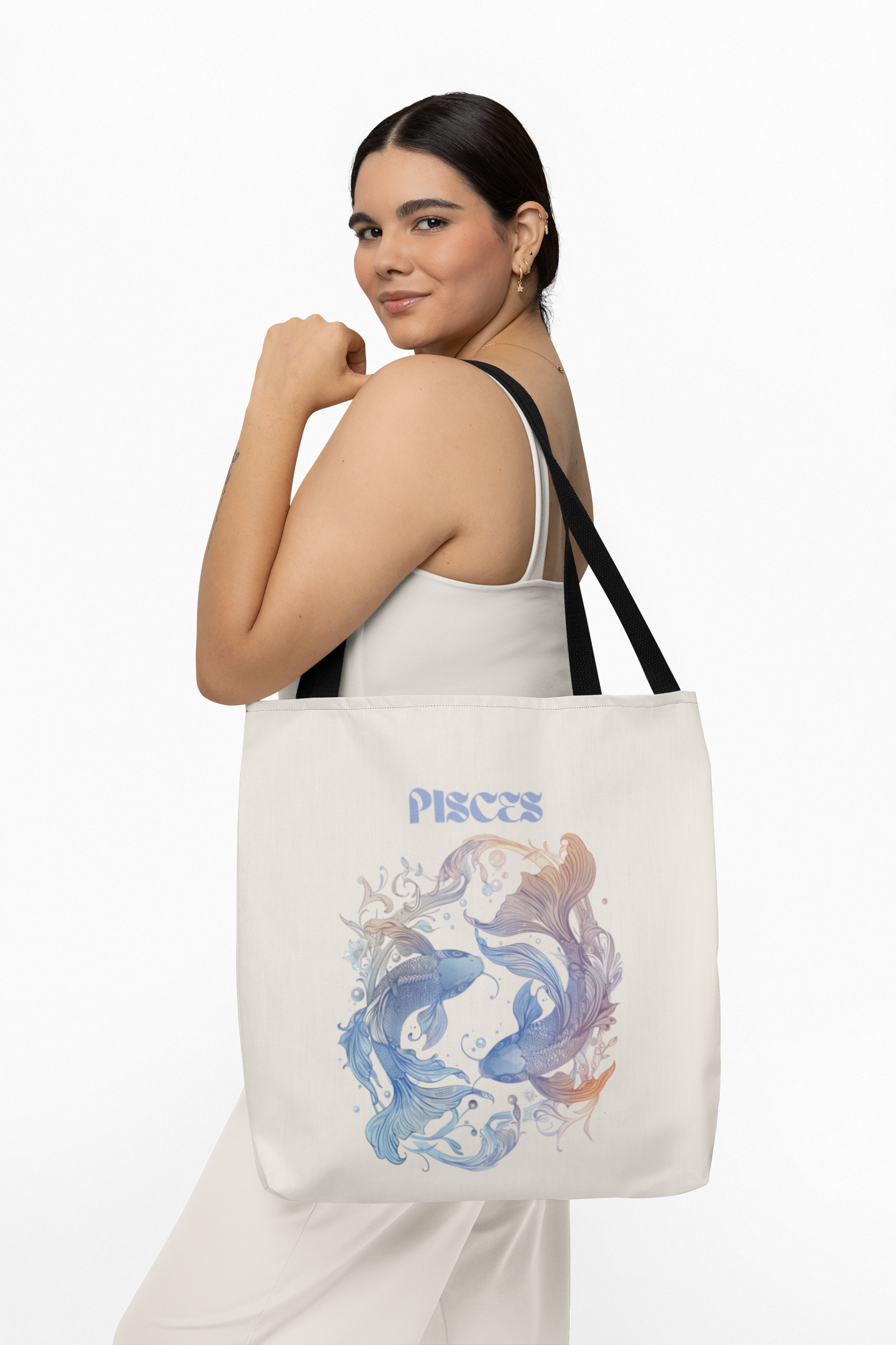 a woman carrying an astro tote bag over her shoulder