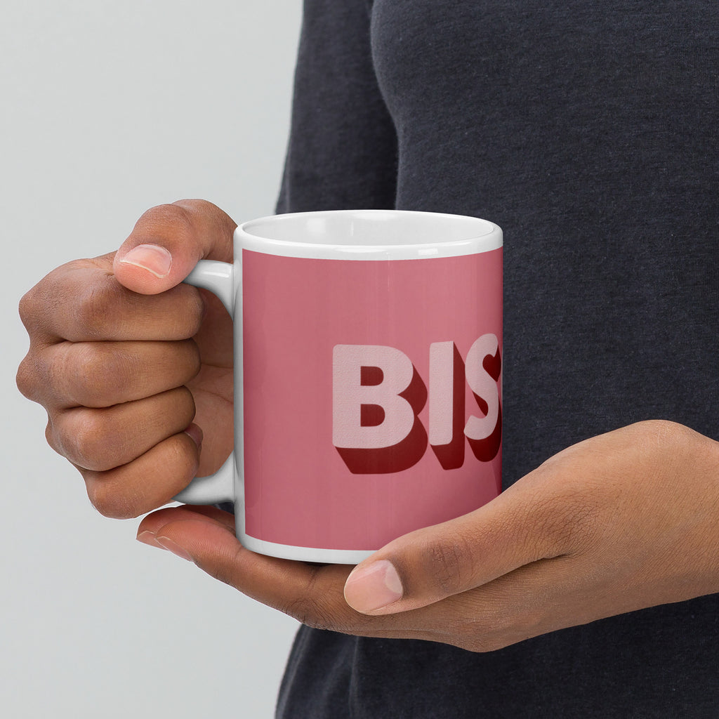 hands holding Bisous pink 11oz mug