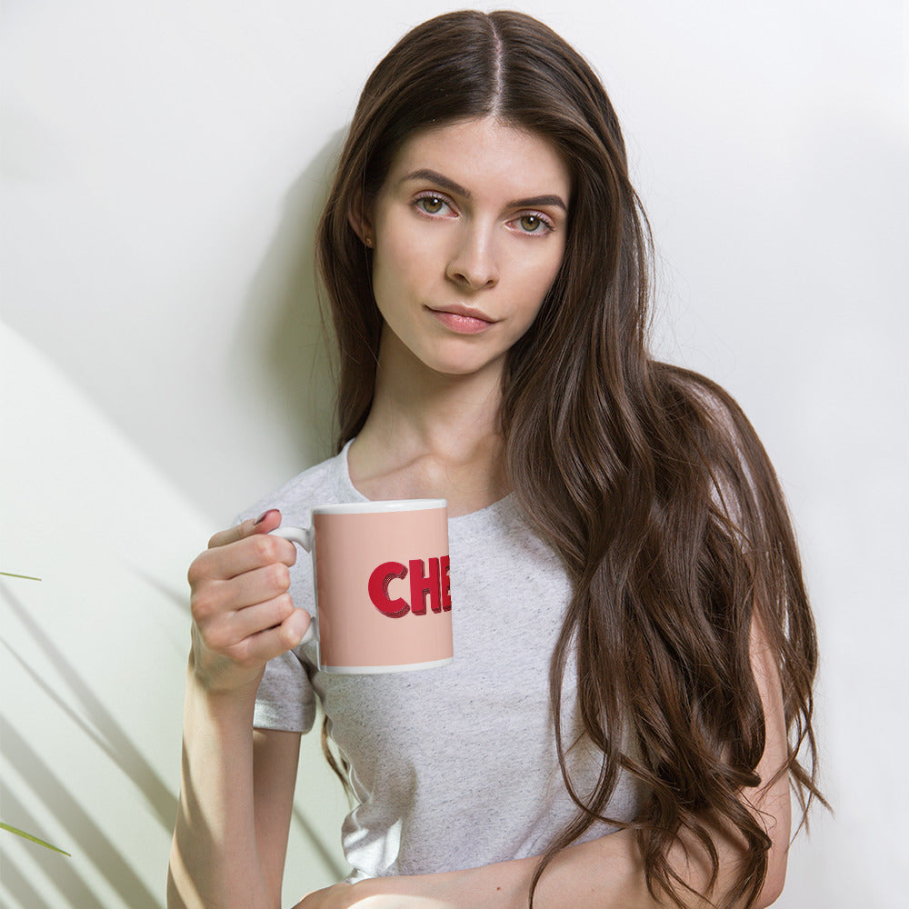 woman holding Chérie pink 11 oz mug