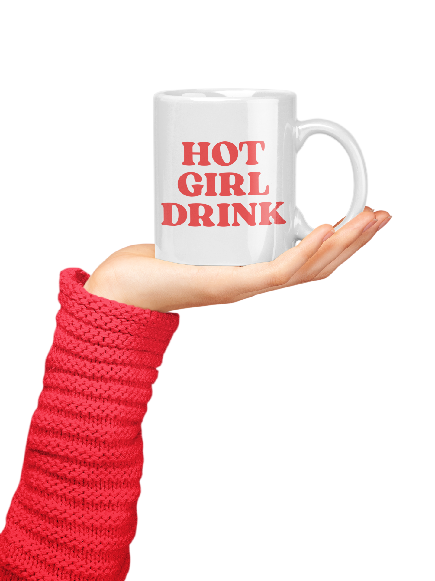 Photo d’une main féminine vêtue d’un pull rouge tenant un mug blanc avec l’inscription “HOT GIRL DRINK” en lettres rouges, symbole d’énergie, de confiance et de fun.