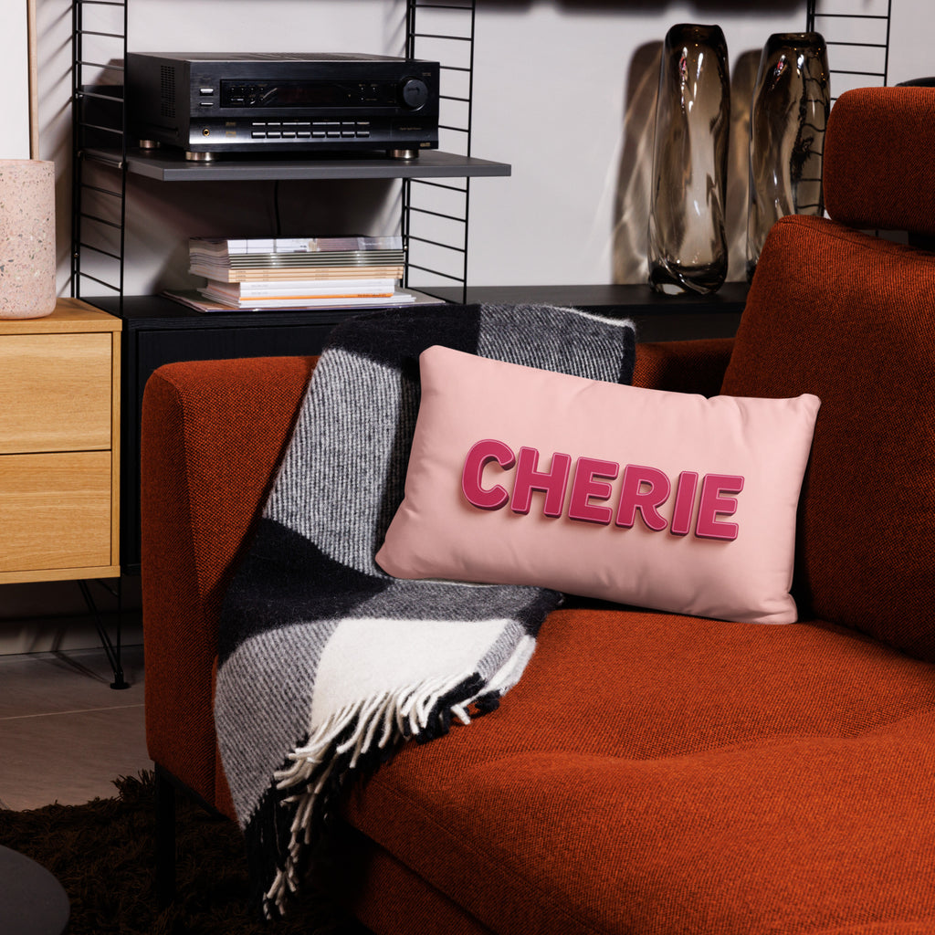 colorful living room with a pink throw pillow