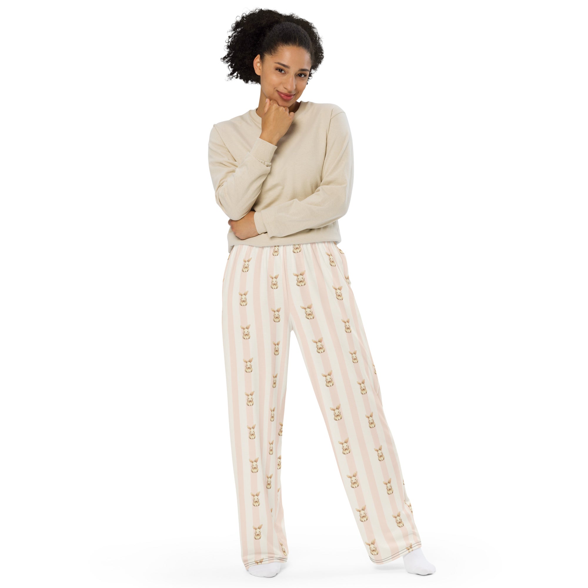 woman wearing Lounge wear beige and pink bunny wide leg pants